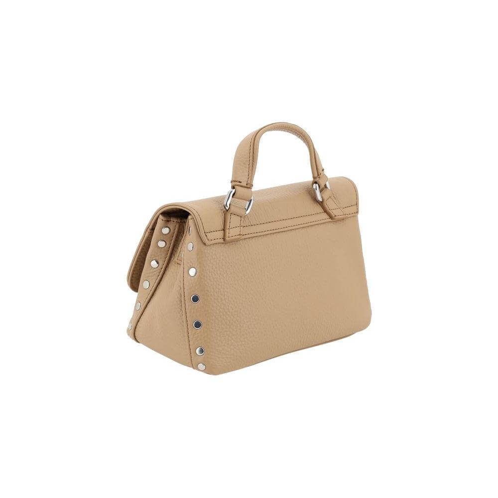 Zanellato Postina Daily Shoulder Bag in calfskin with metallic studs, short handle, removable strap, and grained leather design.