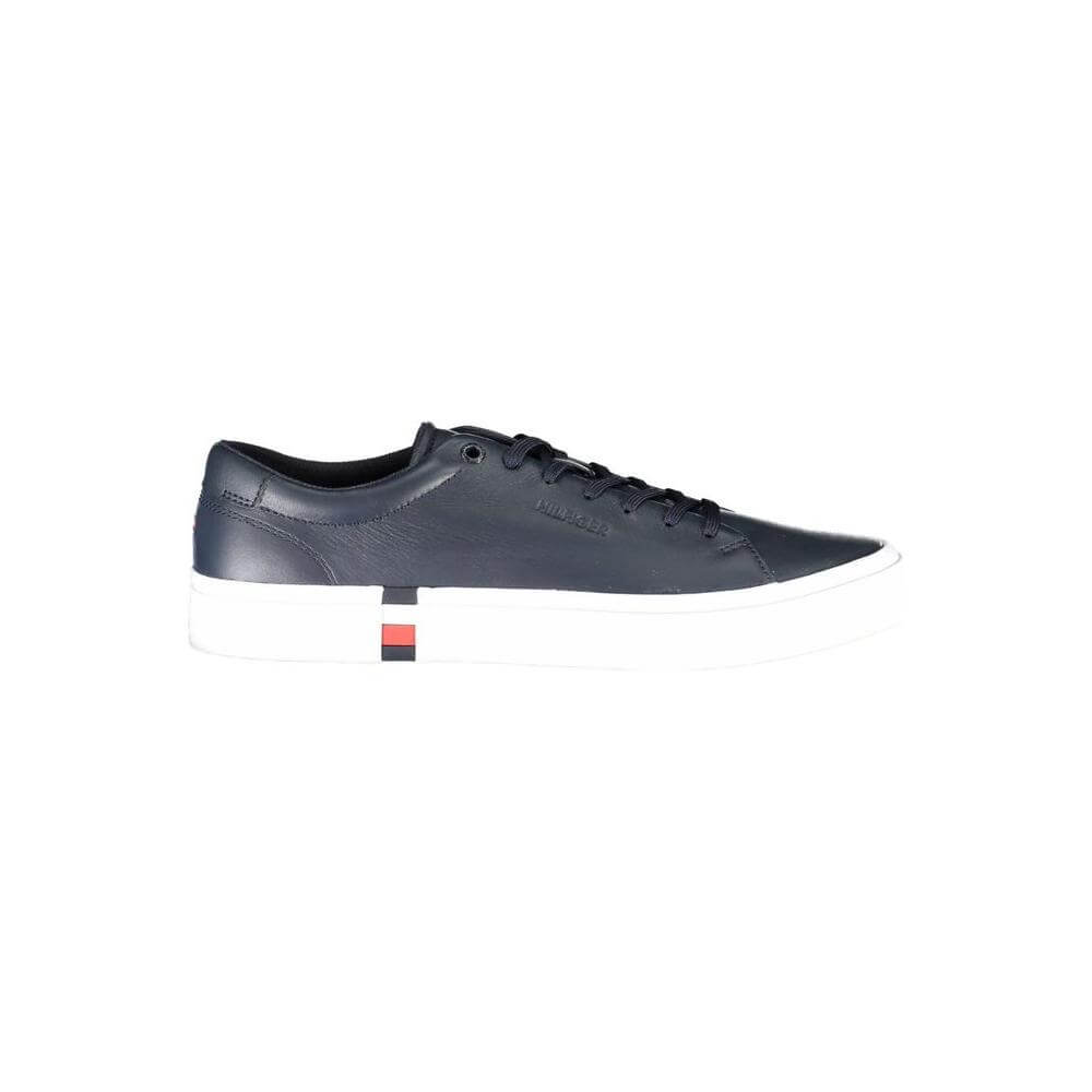 Tommy Hilfiger blue leather men's sneaker with white sole and signature logo, combining style and eco-conscious design.