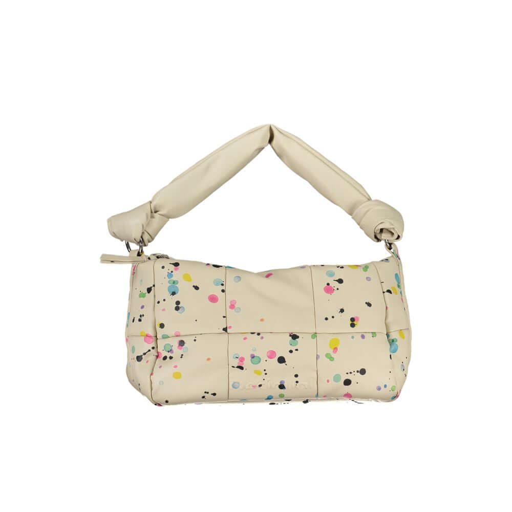 Desigual beige handbag with colorful splatter design, single handle, adjustable strap, internal pocket, and zip closure.