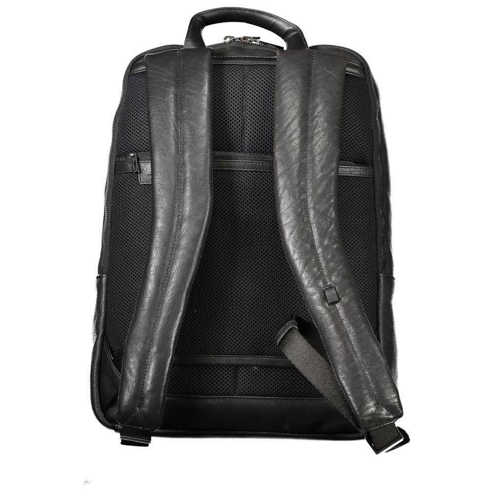 Rear view of Piquadro black leather men's backpack highlighting adjustable straps and ergonomic design.