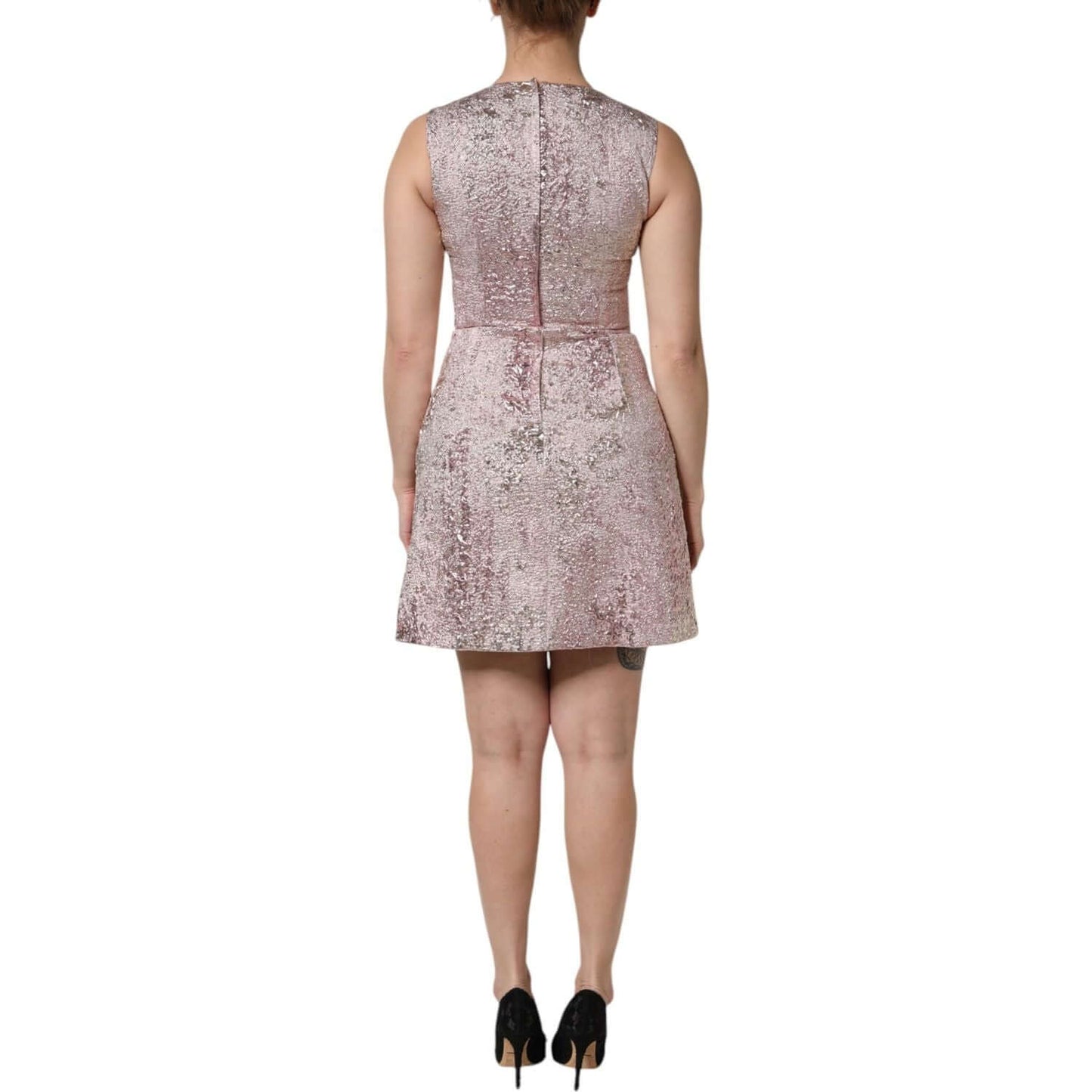 Back view of Dolce & Gabbana pink jacquard sleeveless sheath mini dress, A-line, featuring high craftsmanship and zipper closure.