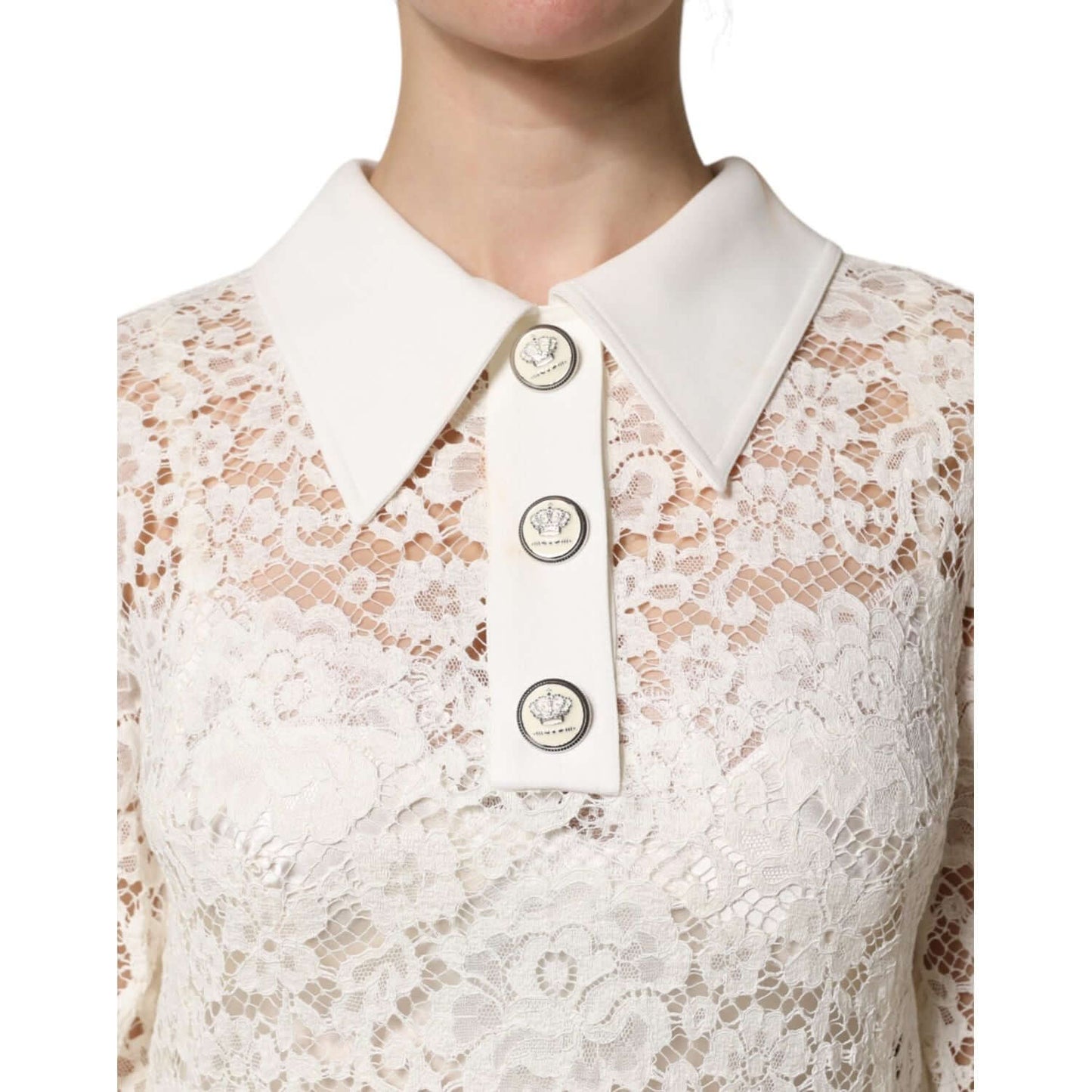 Dolce & Gabbana white floral lace shift dress with button details and collar, highlighting intricate design and exclusive Italian craftsmanship.
