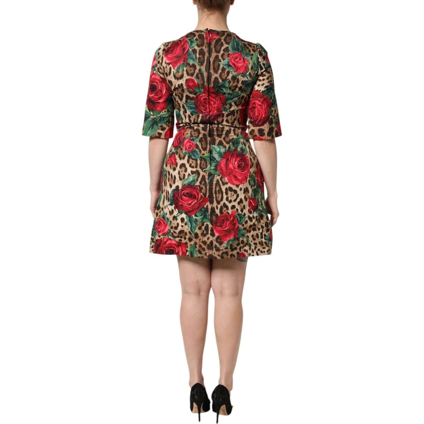 Dolce & Gabbana brown leopard mini dress with red roses, back view, short sleeves, A-line style, worn by a model.