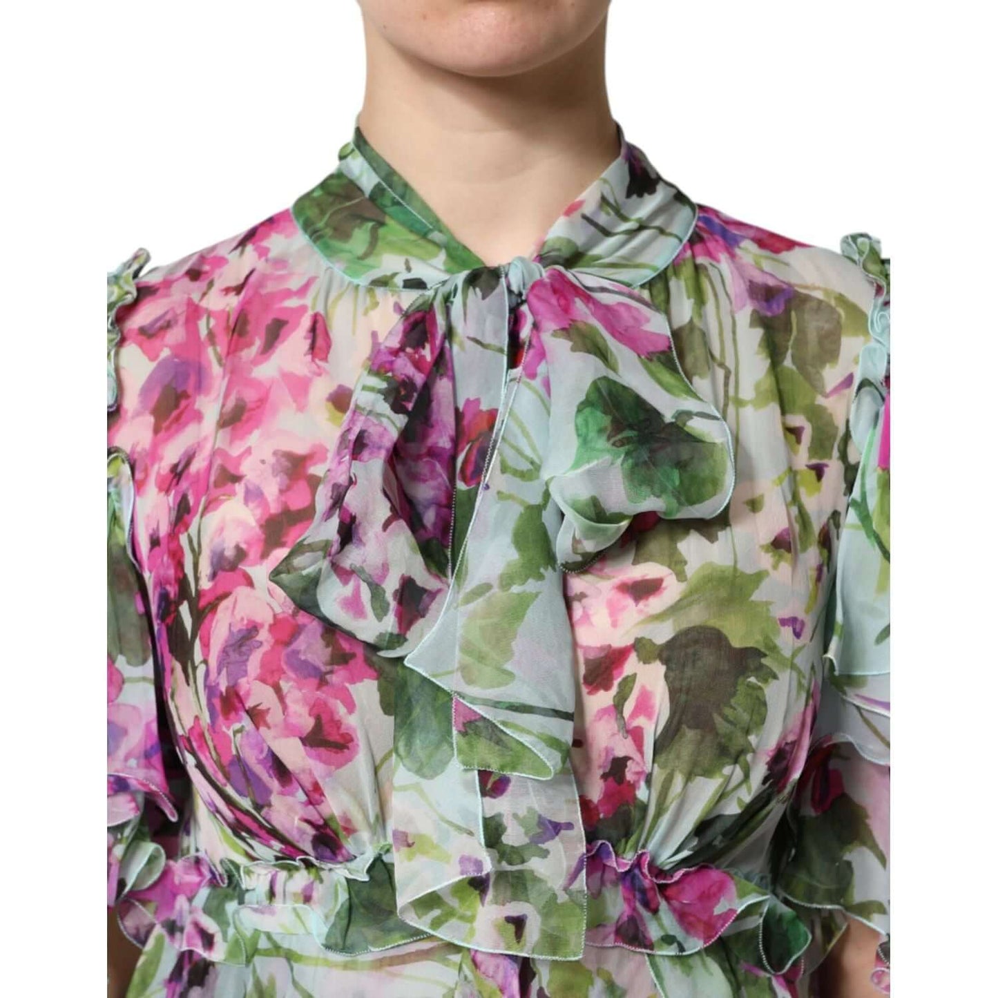 Dolce & Gabbana multicolor floral silk midi dress with layered design and bow detailing, showing exquisite Italian craftsmanship.