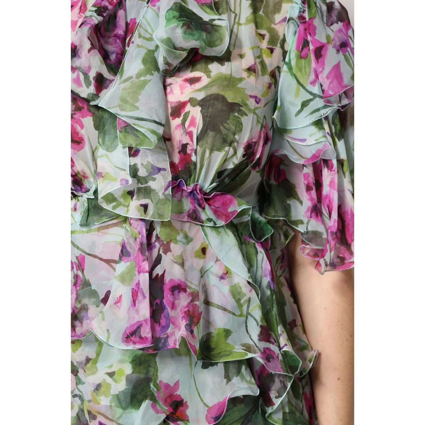 Dolce & Gabbana multicolor floral silk layered midi dress close-up, showcasing vibrant floral design and ruffled craftsmanship.