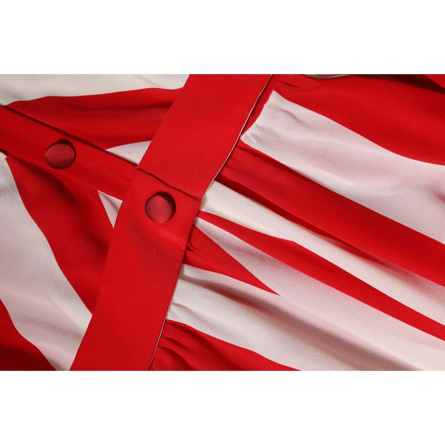 Dolce & Gabbana white and red striped silk mini dress fabric detail with buttons, showcasing luxurious craftsmanship.