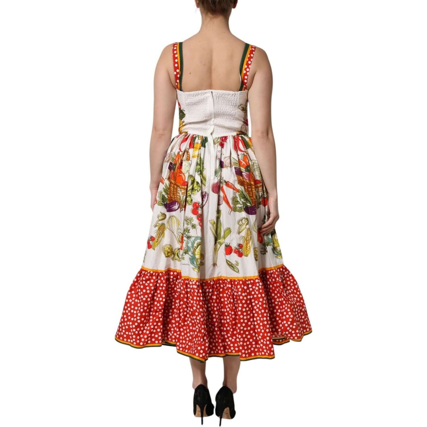 Back view of Dolce & Gabbana white vegetables sleeveless A-line dress with red polka dot hem, 100% cotton fabric, zipper closure.