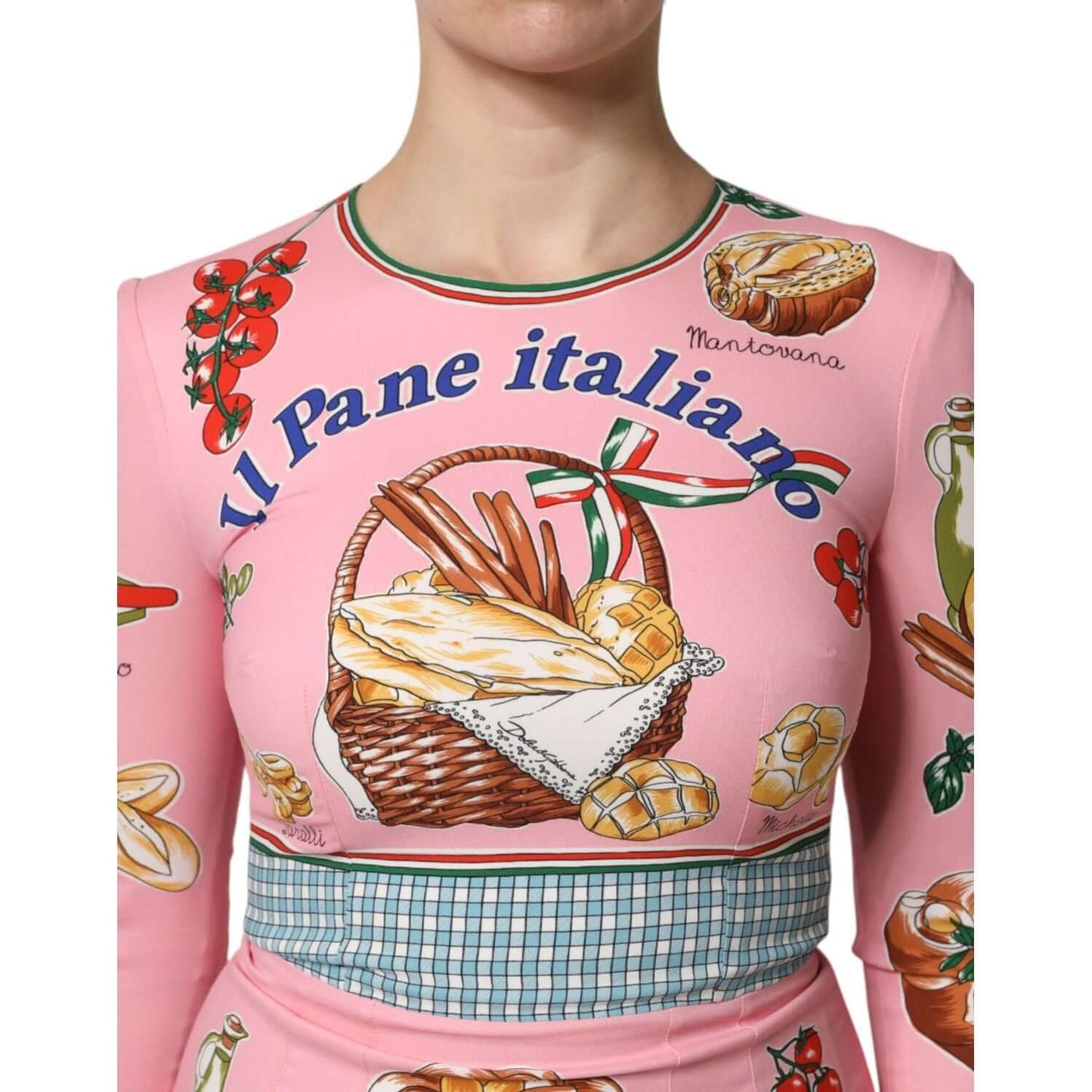 Dolce & Gabbana pink pastry print bodycon dress with Italian bread graphic and iconic logo details, featuring long sleeves.