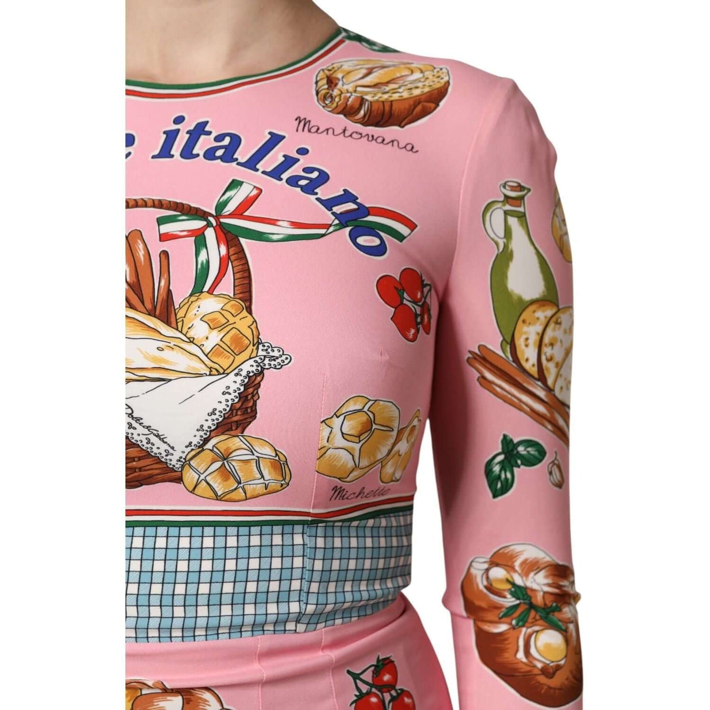 Dolce & Gabbana pink pastry print bodycon sheath midi dress close-up showing intricate Italian-inspired design details.