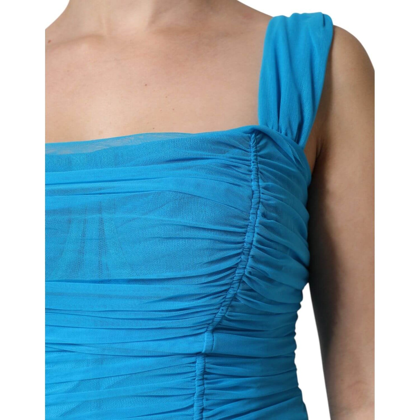 Close-up of Dolce & Gabbana blue mesh trim ruched tulle sheath dress, featuring a sleeveless design with high craftsmanship. Made in Italy.