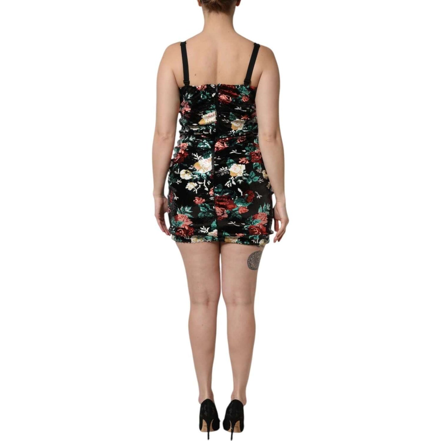 Rear view of Dolce & Gabbana black floral sequined sleeveless sheath dress, mini length, showcasing floral design and exclusive craftsmanship.