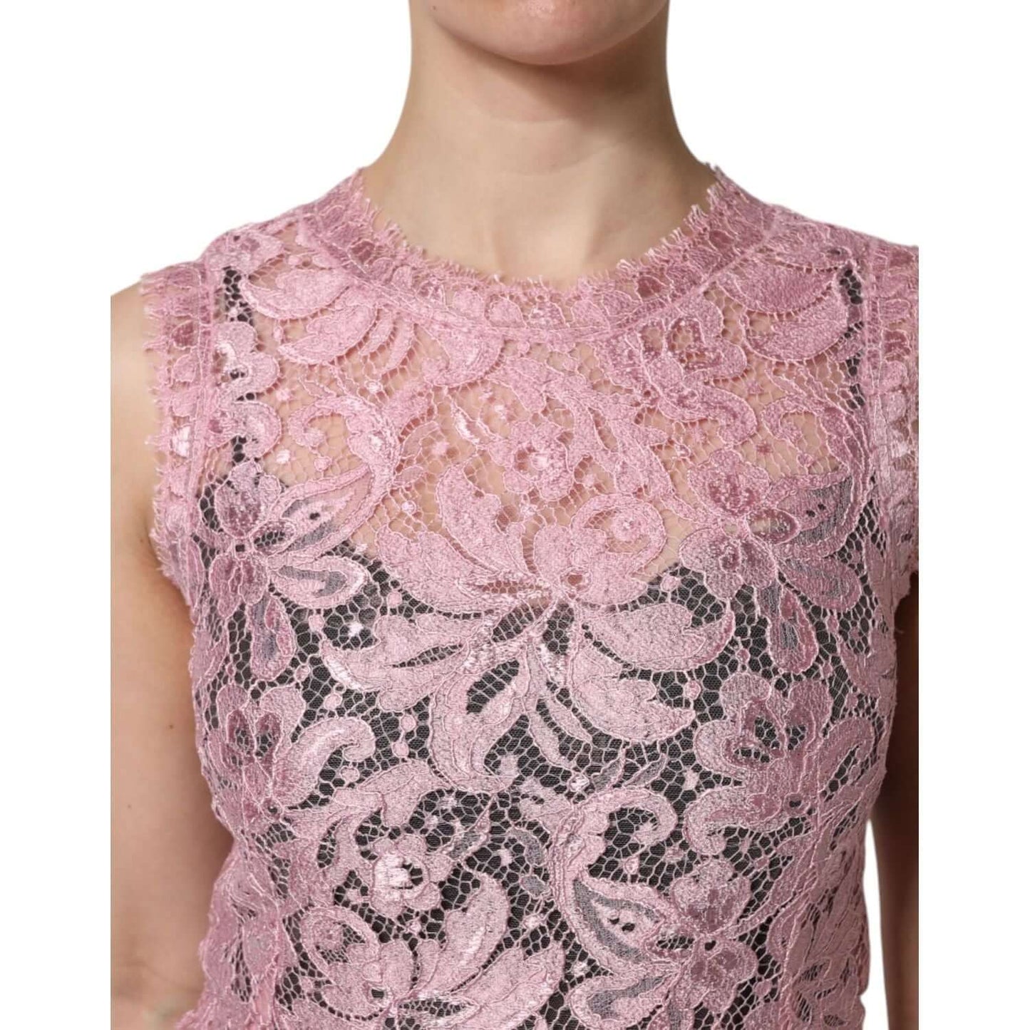 Dolce & Gabbana pink floral lace sleeveless sheath dress close-up, showcasing intricate lace pattern and craftsmanship.