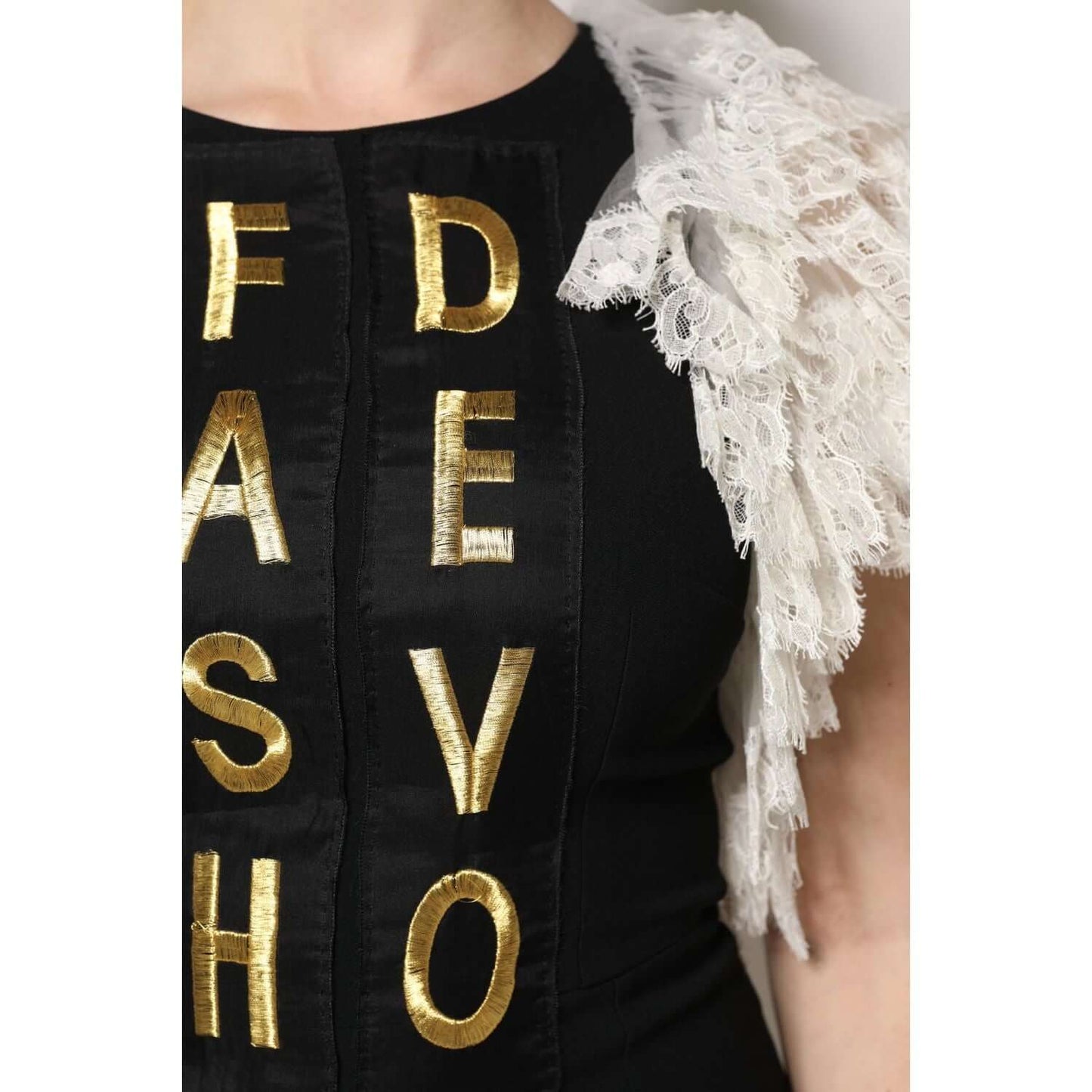 Dolce & Gabbana black mini dress with fashion devotion gold embellishments and white lace detail