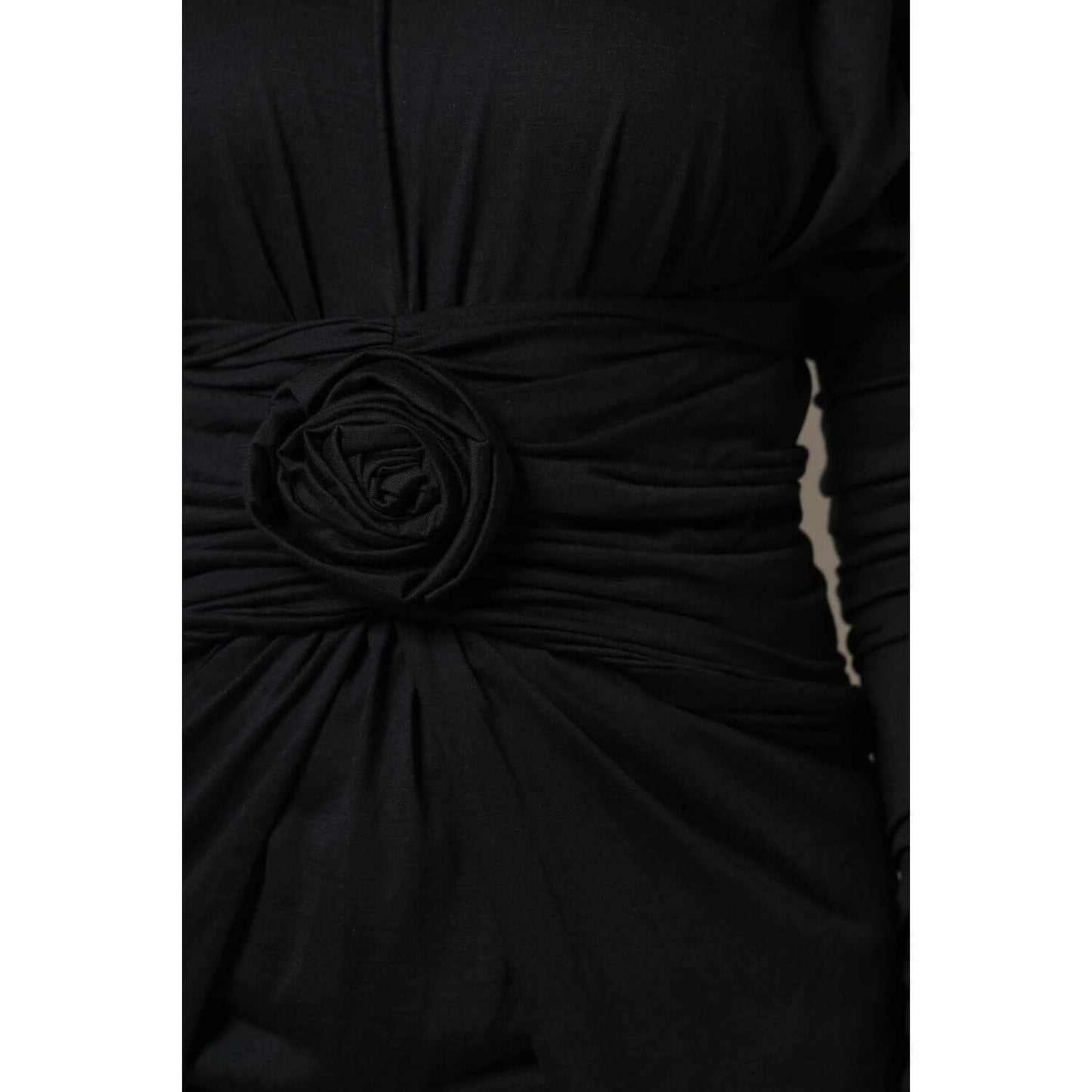 Dolce & Gabbana black wool sheath midi dress, long sleeves, featuring a fitted waist with floral detail. Luxury Italian craftsmanship.