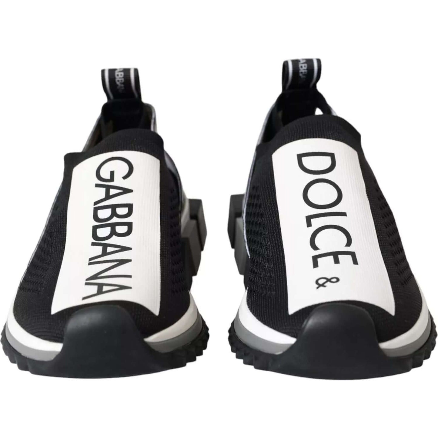 Dolce & Gabbana Sorrento sneakers in black and white with logo print, slip-on design, fabric pull strap, rubber sole, front view.