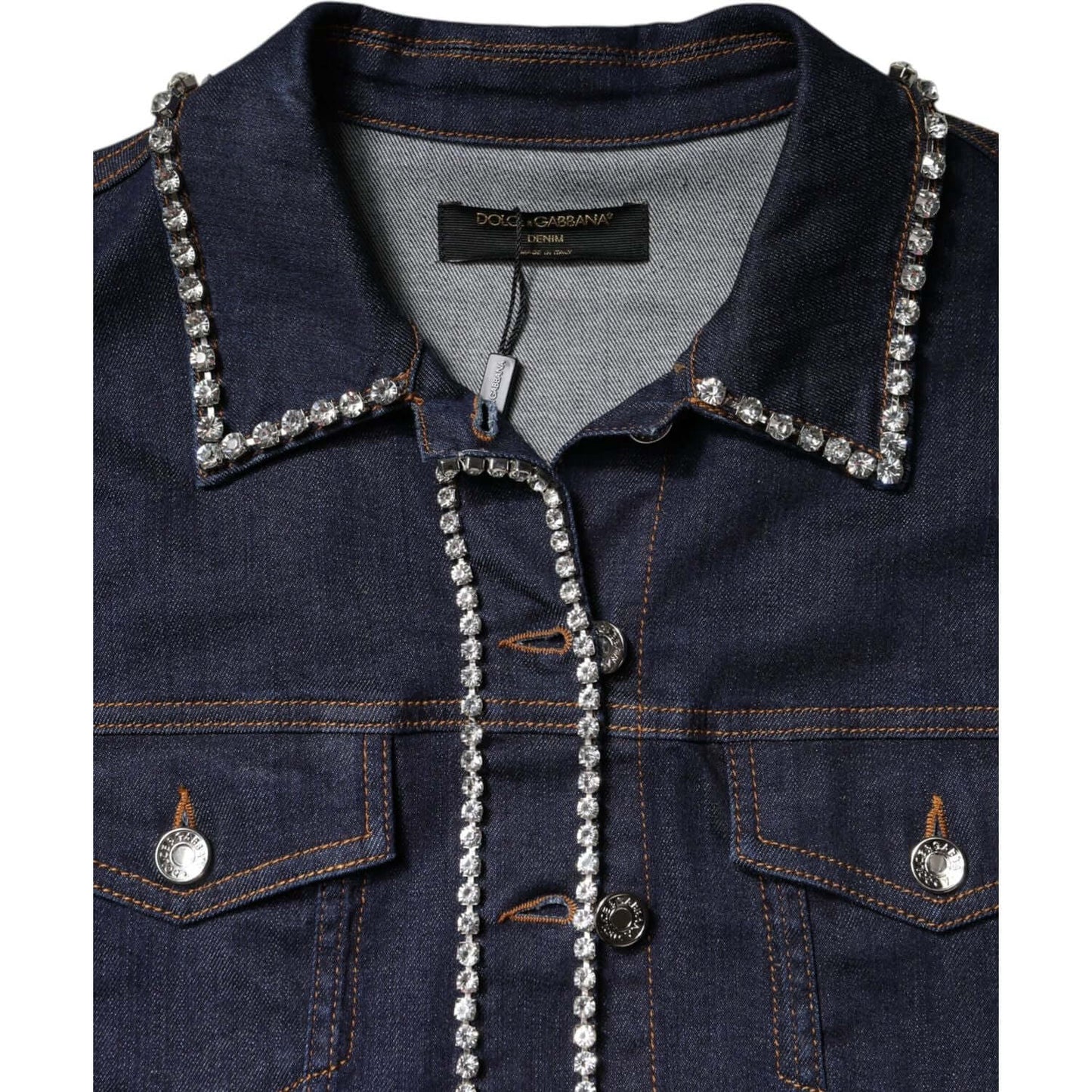 Dolce & Gabbana blue denim jacket with crystal embellishments, button down front, long sleeves, logo details, elegant and exclusive design.