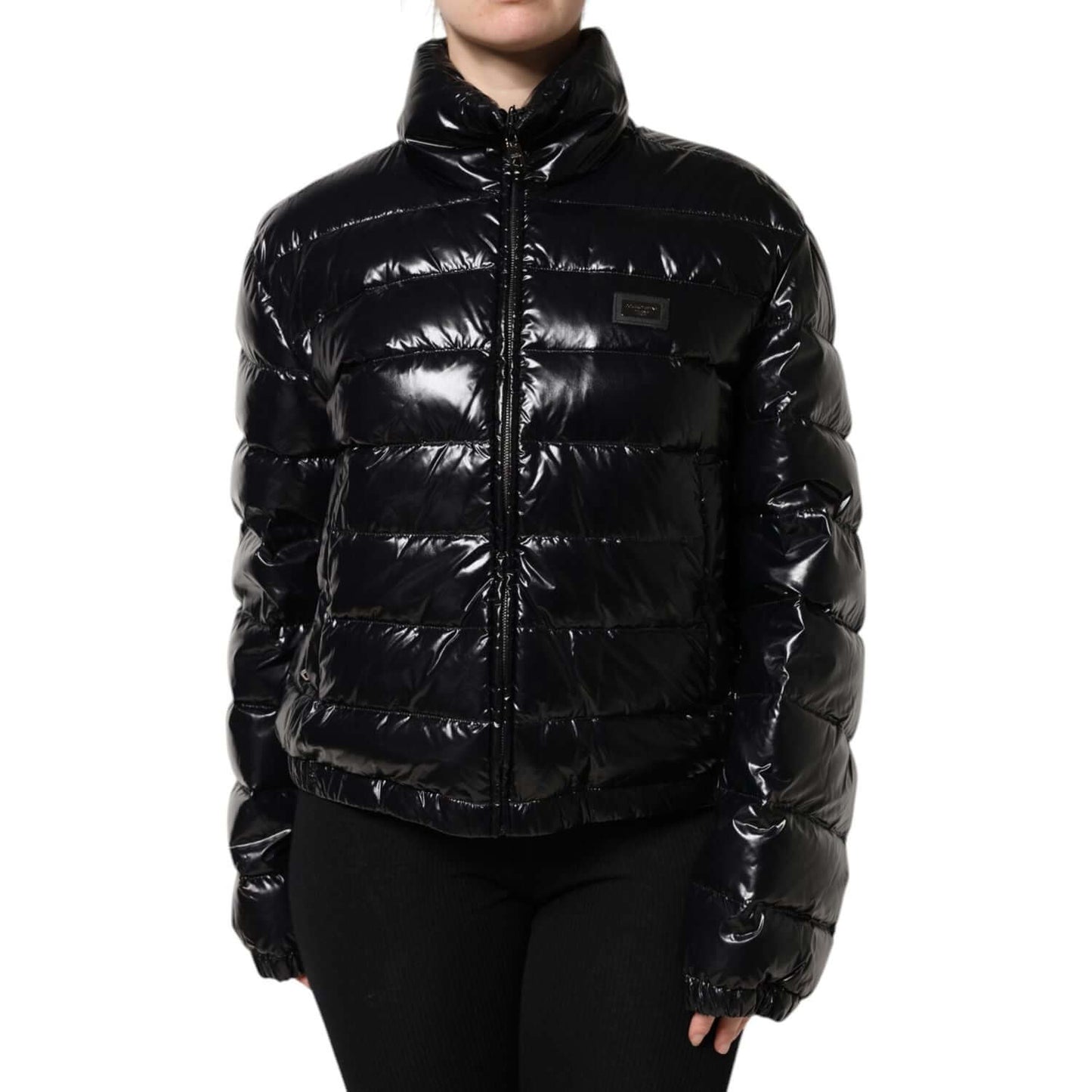 Dolce & Gabbana black full zip puffer jacket with logo plaque, long sleeves, made from nylon and polyurethane, high craftsmanship, Italian made.