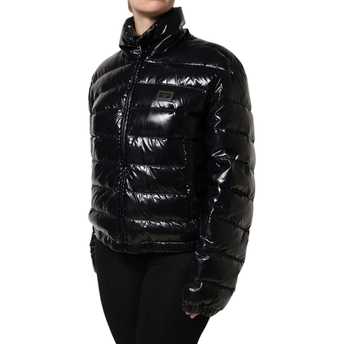 Dolce & Gabbana black puffer jacket with logo plaque, full zip, long sleeves, high-quality nylon-polyurethane blend, made in Italy.