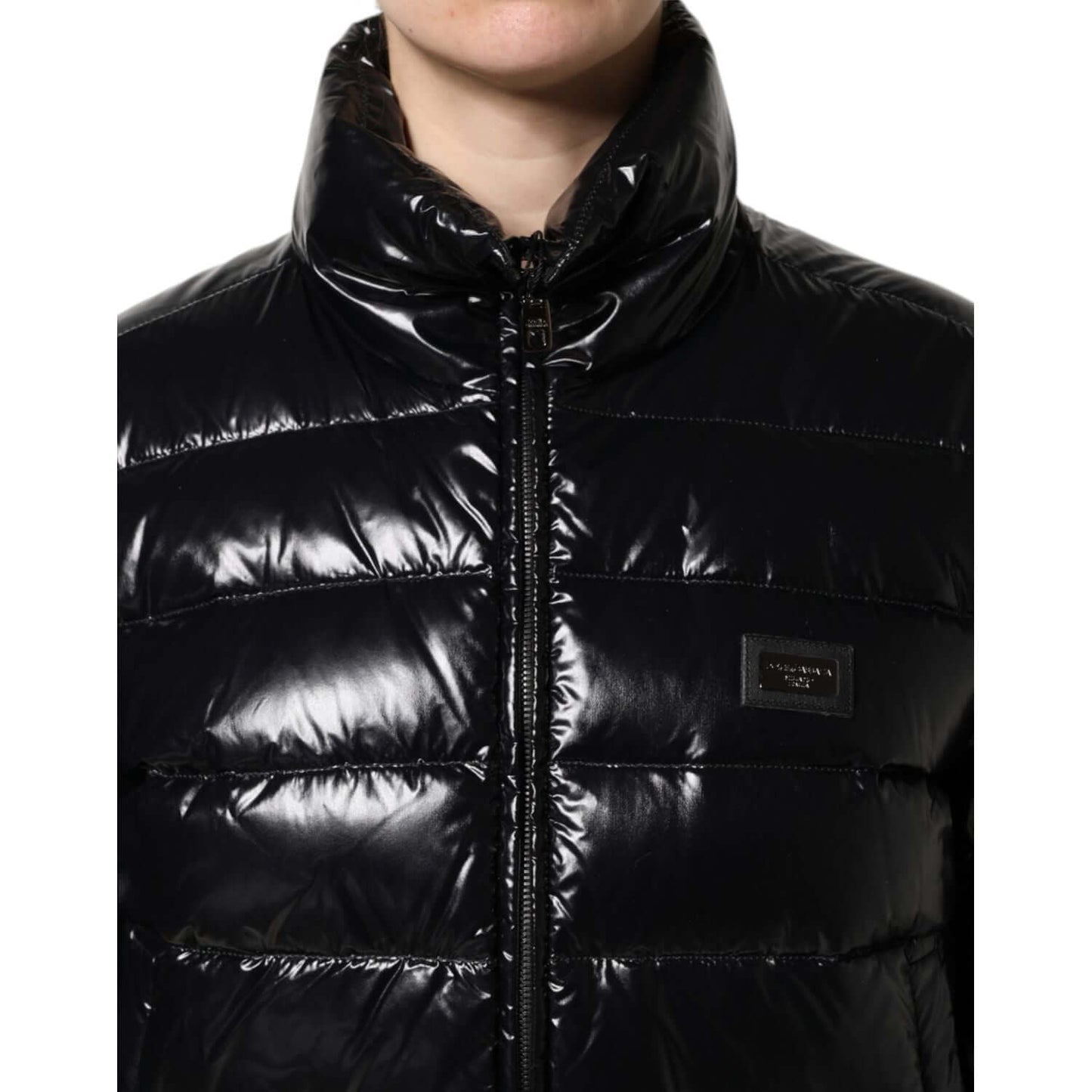 Dolce & Gabbana black puffer jacket with logo plaque, full zip closure, long sleeves, made in Italy, high craftsmanship, exclusive material.