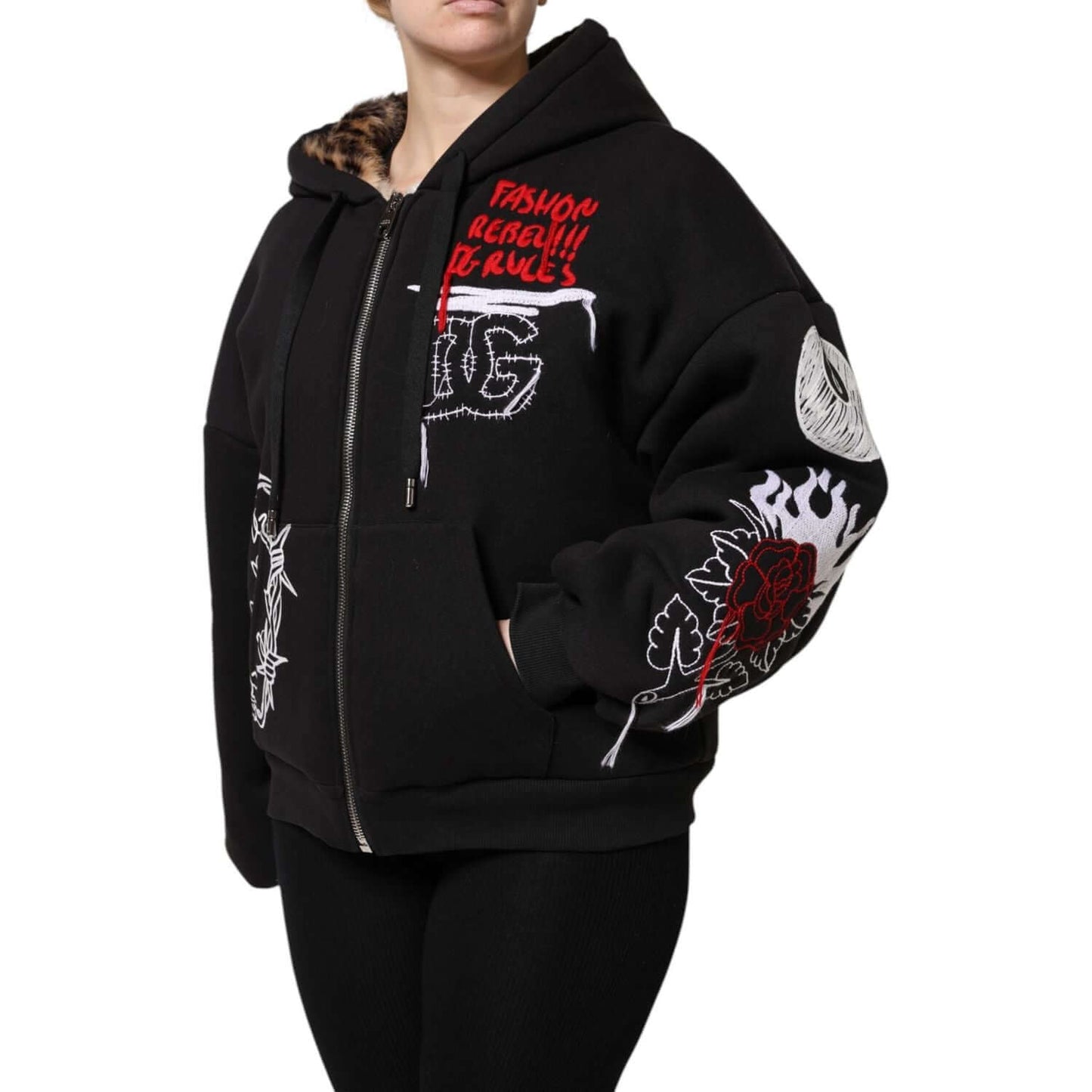 Dolce & Gabbana black embroidered hooded jacket with full zip and logo details, featuring unique designs and Italian craftsmanship.