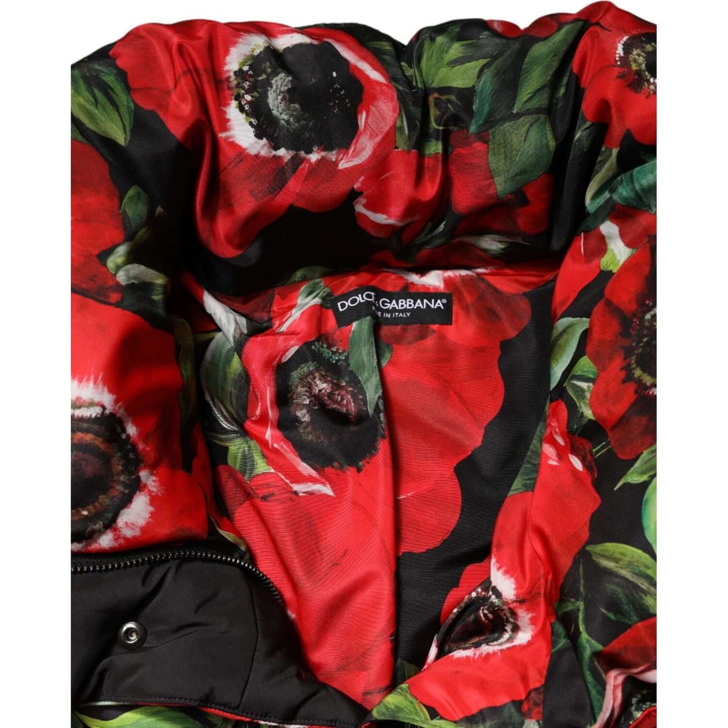 Dolce & Gabbana multicolor floral padded jacket with full zip, featuring red and green floral pattern, made in Italy, high craftsmanship.