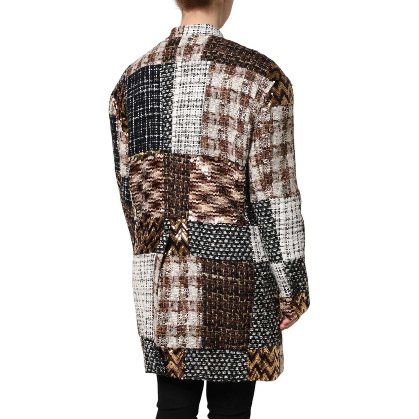 Back view of Dolce & Gabbana multicolor patchwork button-down jacket with long sleeves, featuring various patterns and high craftsmanship.