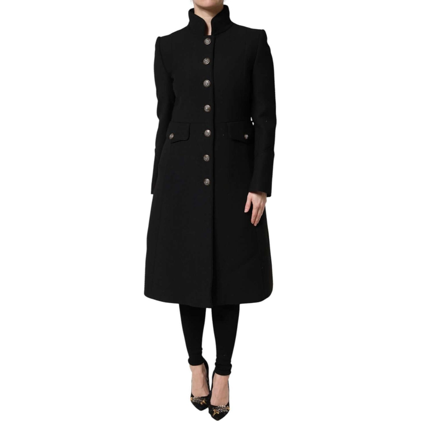 Dolce & Gabbana black wool trench coat jacket, single-breasted, with button closure and logo details, worn by a model.