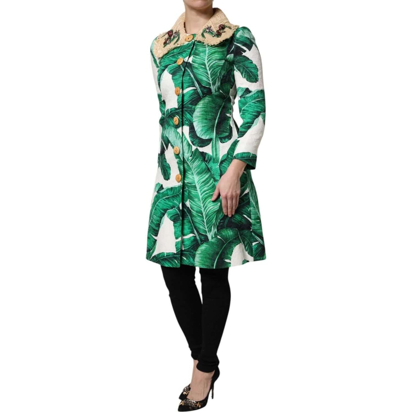 Dolce & Gabbana multicolor leaf print trench coat jacket with button closure, featuring luxurious fabric blend, worn by model.