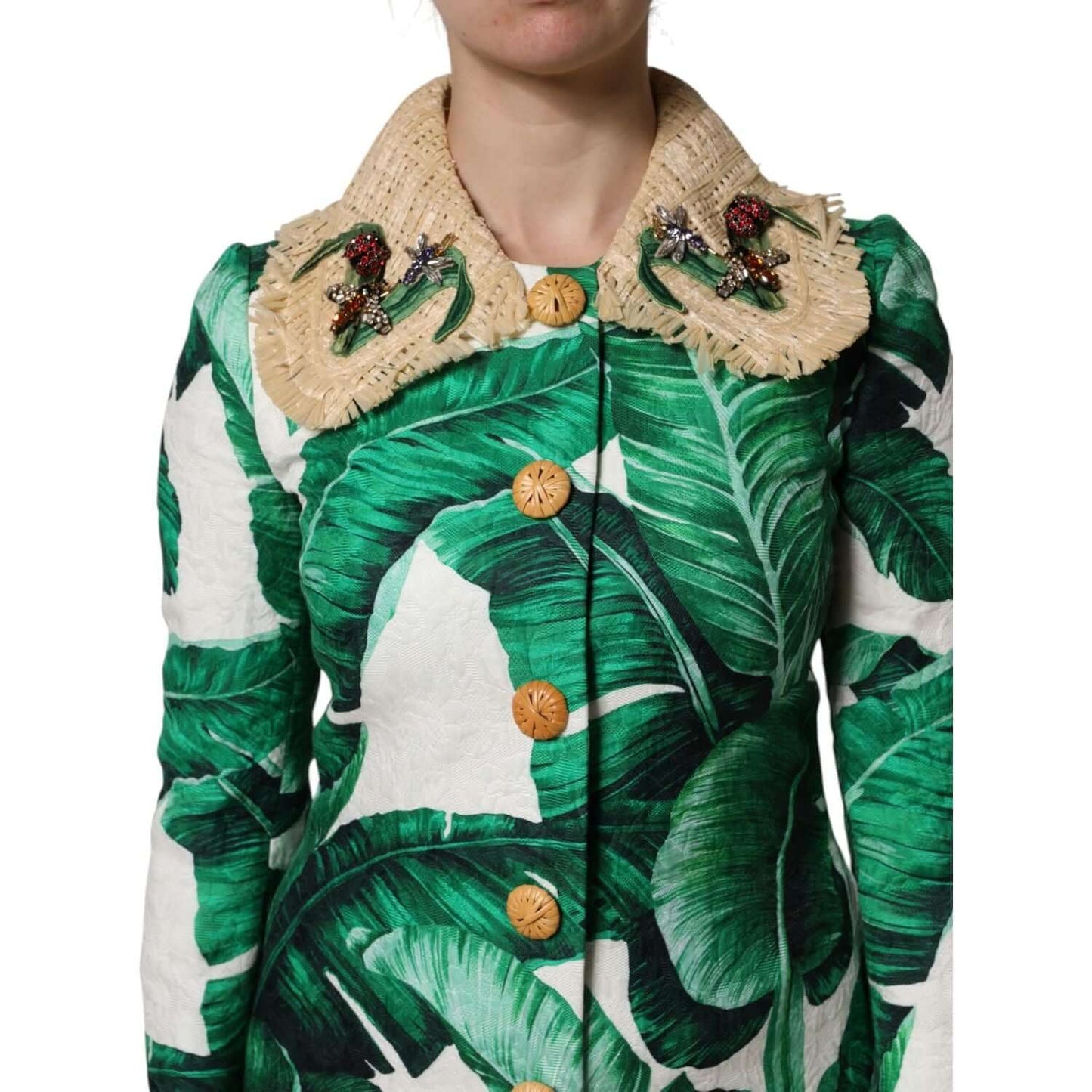 Dolce & Gabbana multicolor leaf print trenchcoat with embellishments, button closure, showcasing Italian craftsmanship.