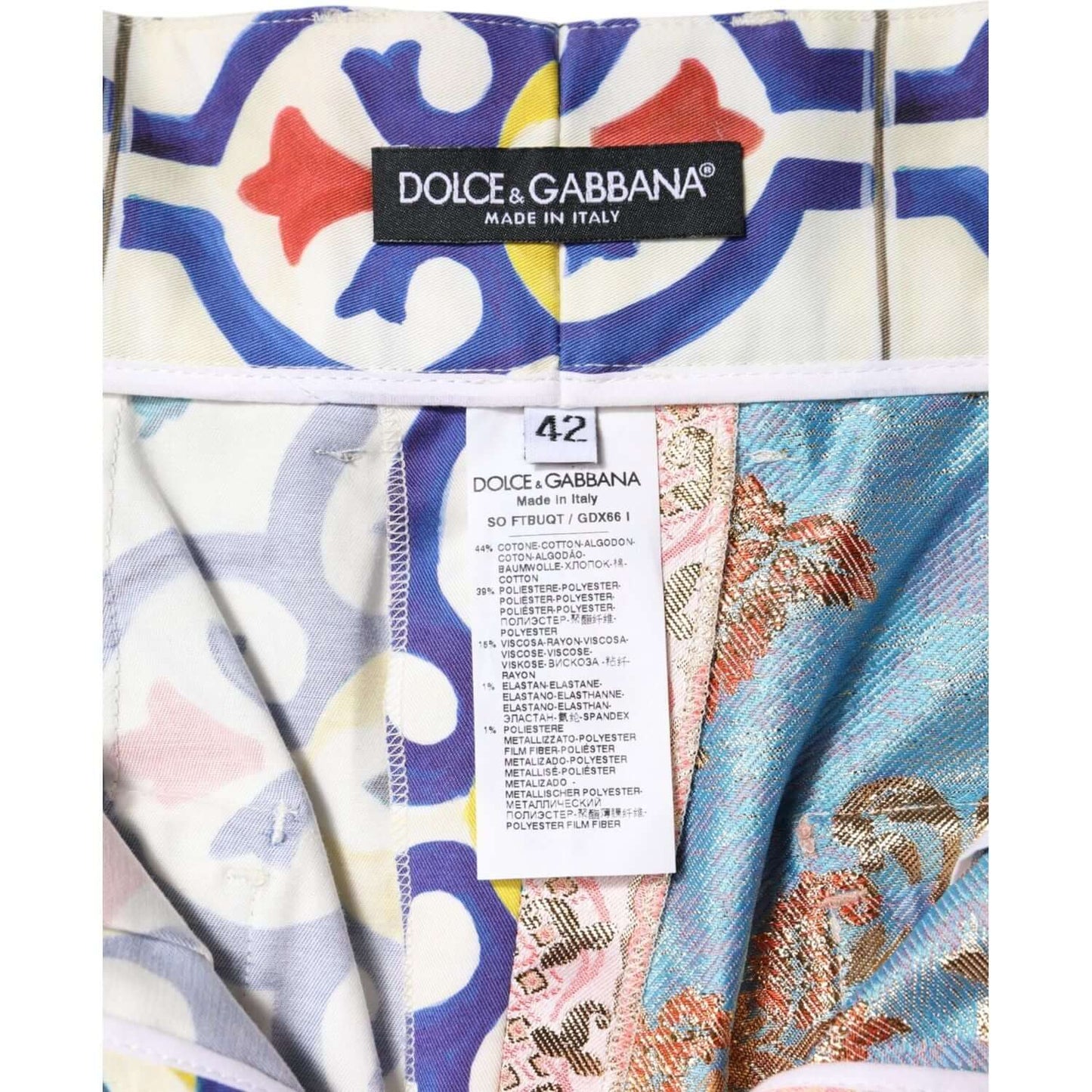Close-up of Dolce & Gabbana multicolor high waist hot pants shorts, showing intricate Majolica, Jacquard, Brocade patterns and label.