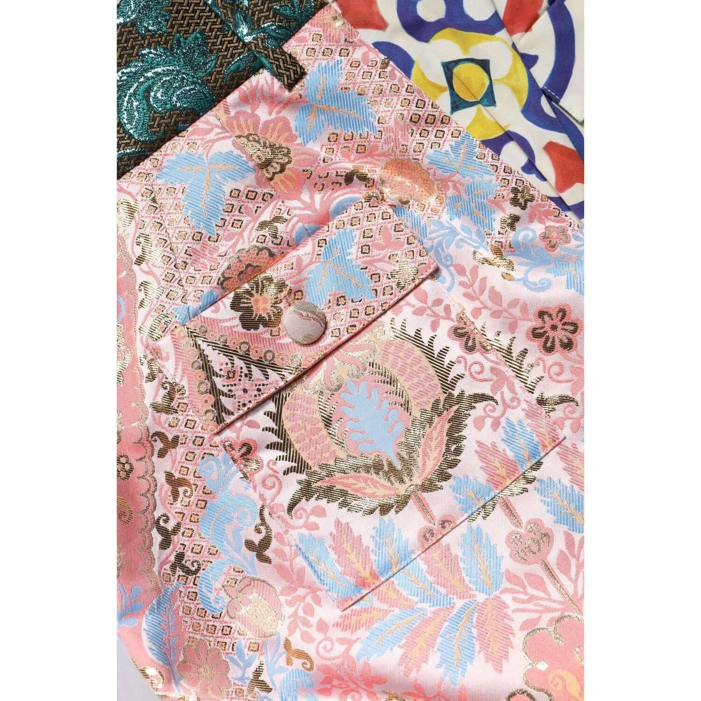 Close-up of Dolce & Gabbana multicolor high waist hot pants shorts with Majolica, jacquard, and brocade patterns.