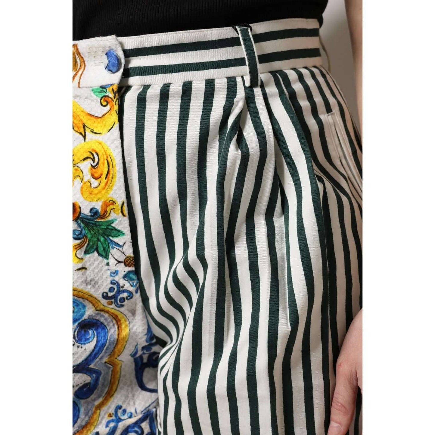 Close-up of Dolce & Gabbana high waist multicolor majolica print shorts with striped design and logo details.