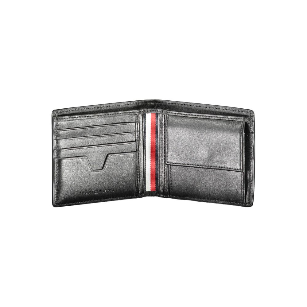 Open Tommy Hilfiger Black Leather Men Wallet showing card slots and coin purse with logo detail.
