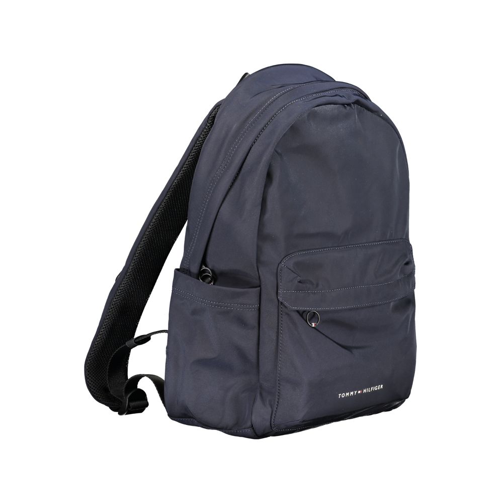 Tommy Hilfiger Blue Polyester Backpack with handle, adjustable straps, external pockets, and internal laptop compartment.