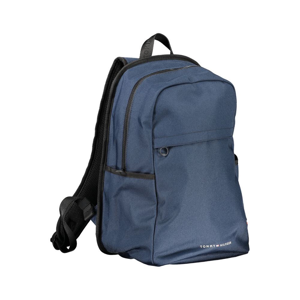 Tommy Hilfiger Blue Polyester Backpack with adjustable straps, external and internal pockets, laptop compartment, and logo print.