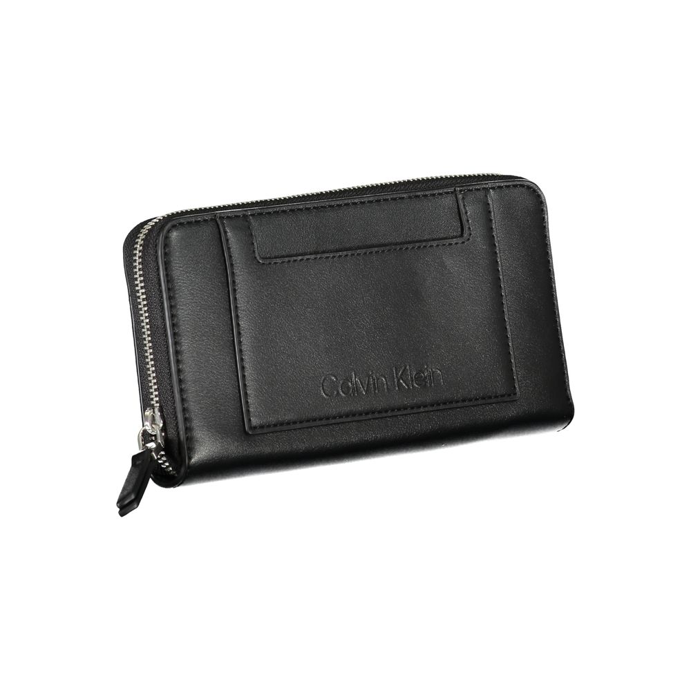 Calvin Klein Black Polyester Wallet with zip closure, 5 compartments, coin purse, card spaces, contrasting details, and external pocket.