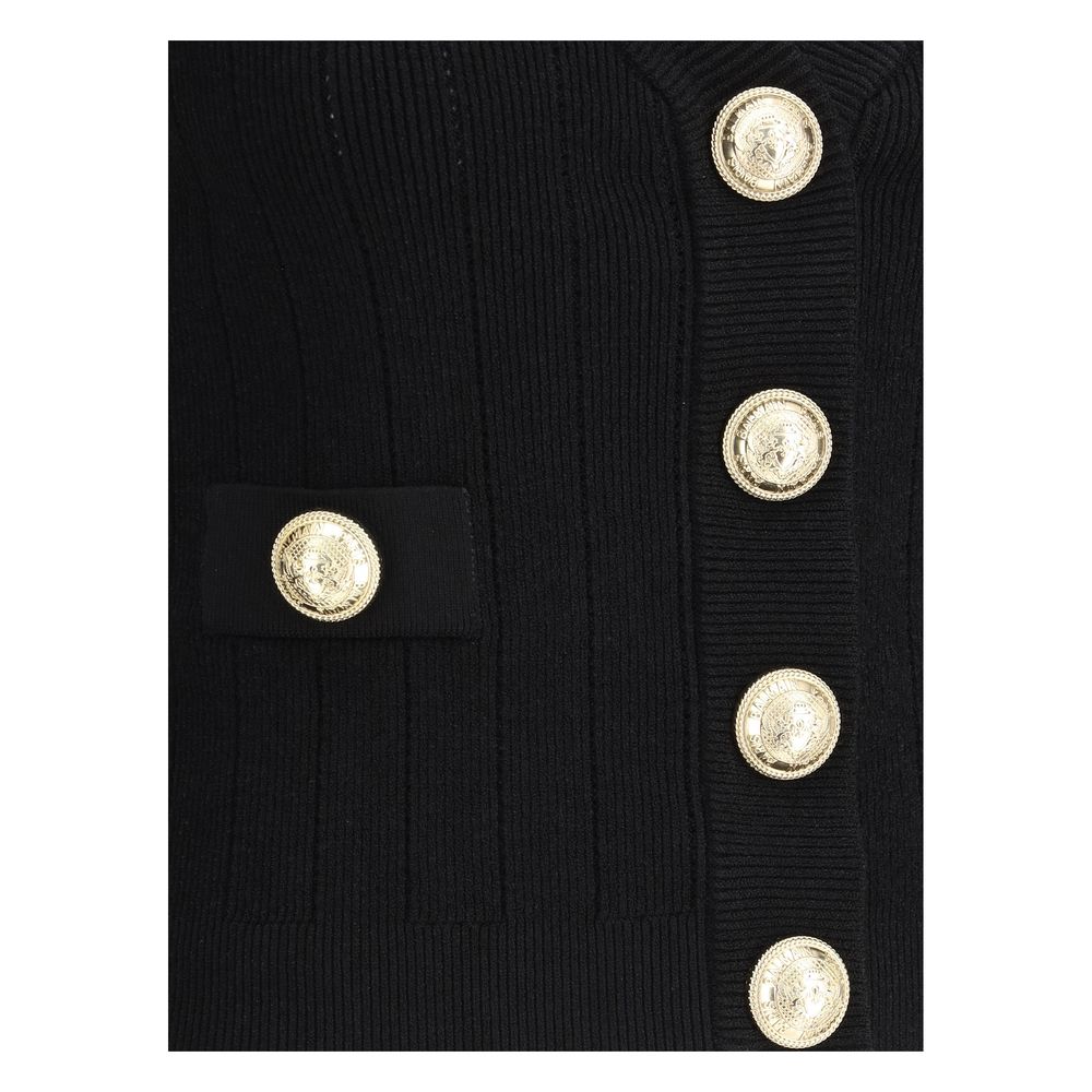 Close-up of Balmain Black Viscose Cardigan with embossed gold buttons, cropped design, V-neck, monochrome pattern, slim fit.