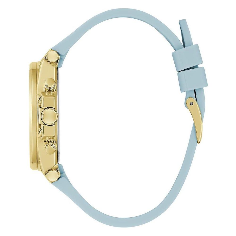 Side view of Guess Blue Synthetic Watch with golden stainless steel case and blue silicone strap, featuring quartz mechanism and dual calendar.