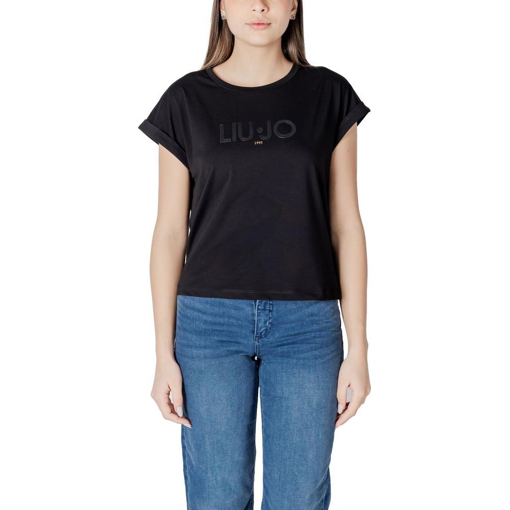 Woman wearing Liu Jo black cotton t-shirt, showcasing short sleeves and logo design, perfect for versatile styling.