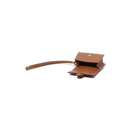 Jacquemus light brown leather Bambino flap case with wrist strap, debossed logo, contrast stitching, suitable for AirPods.