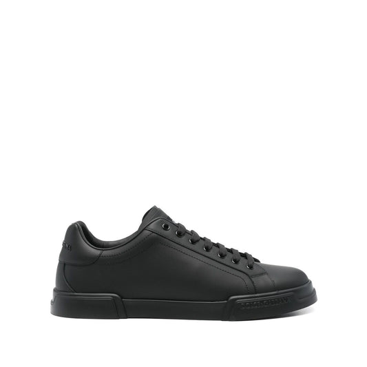 Dolce & Gabbana Sneakers Black, leather Portofino design with lace-up fastening, round toe, and flat rubber sole.