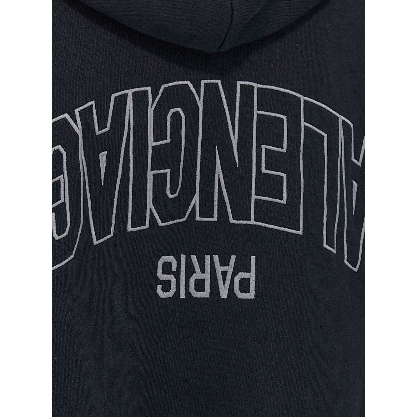 Back view of Balenciaga Sweaters Black with flipped embroidery, showcasing dropped shoulders and long sleeves cotton hoodie.