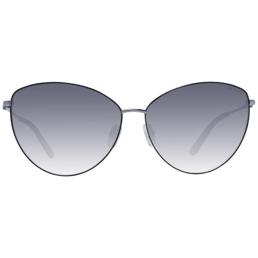 Guess women's gray cat eye sunglasses with gunmetal metal frame and gradient grey lenses offering 100% UVA & UVB protection.