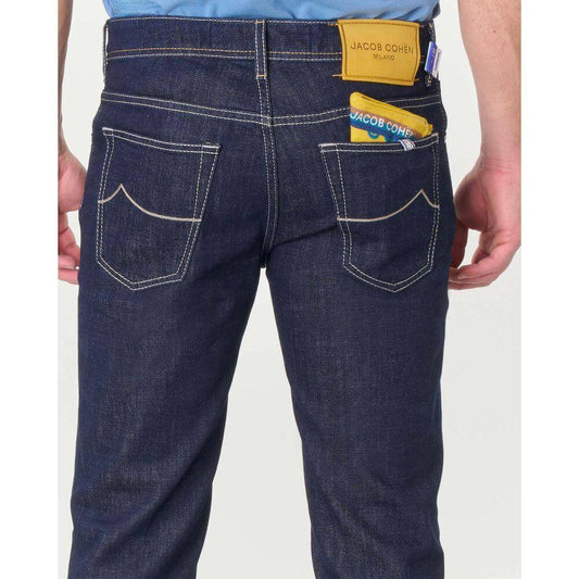 Back view of Jacob Cohen blue cotton jeans with yellow suede patch, showcasing five-pocket design. Made in Italy.