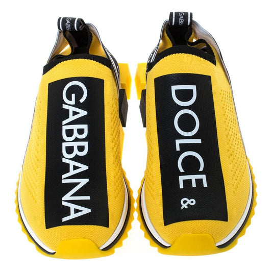 Dolce & Gabbana yellow stretch sneakers with logo print, featuring durable rubber soles, crafted in Italy for stylish comfort.