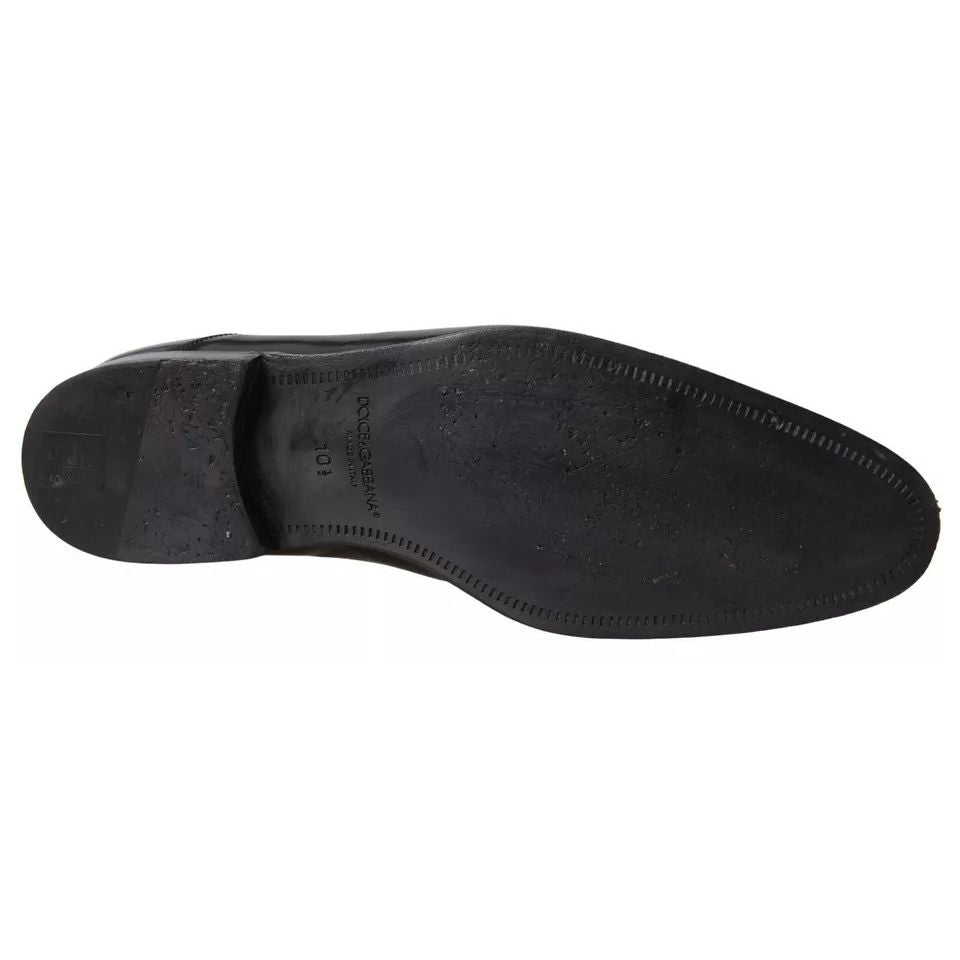 Sole view of Dolce & Gabbana Black Polished Leather Formal Dress Shoes, showcasing leather outer sole with logo details.