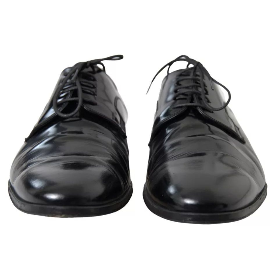 Dolce & Gabbana Black Polished Leather Formal Dress Shoes with laces, crafted in Italy, showcasing high craftsmanship and exclusive design.