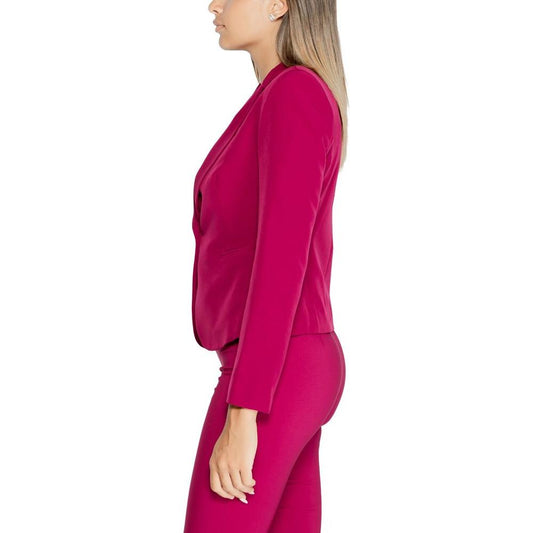 Side view of a woman wearing a Rinascimento Bordeaux polyester suit and blazer, featuring 90% polyester, ideal for fall/winter collection.