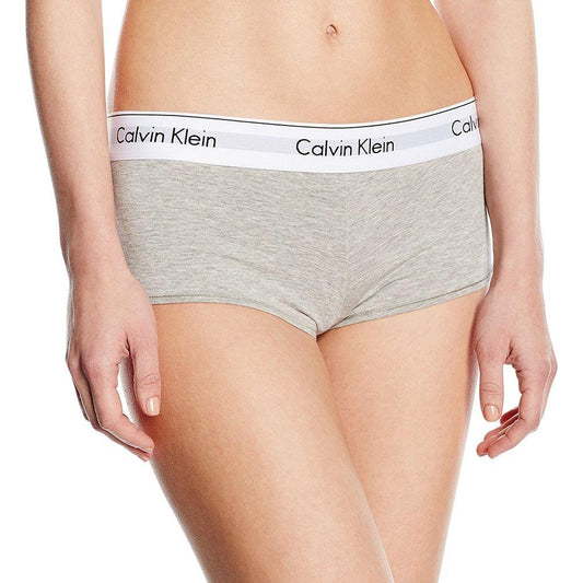 Gray Calvin Klein boyshort underwear with elastic logo waistband, made of cotton, modal, and elastane for comfort and coverage.