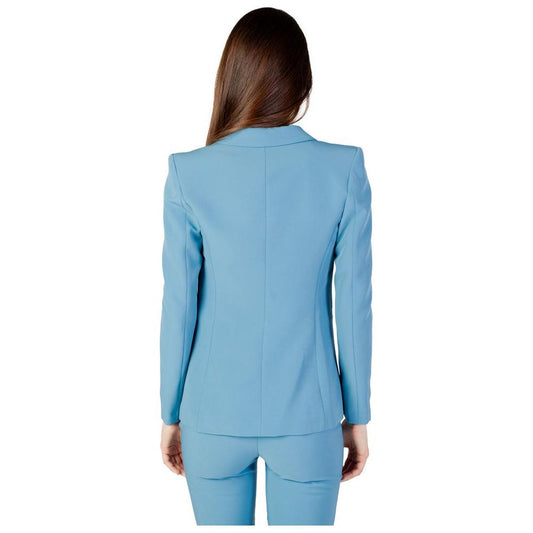 Back view of a Rinascimento turquoise women's blazer suit, 100% polyester, from the Autumn/Winter collection.